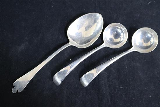 A pair of Edwardian silver Old English pattern sauce ladles by Josiah Williams & Co, London, 1903 & a sterling trefid spoon.